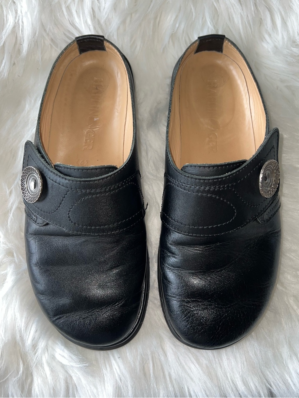 Haflinger Black Leather Slip-On Loafers with Decorative Button
